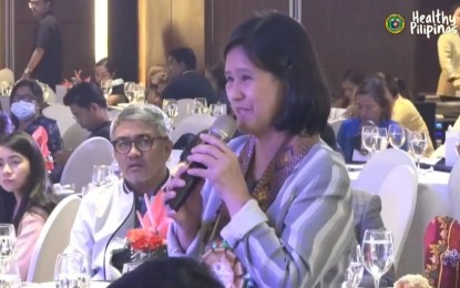 <p><strong>HEALTH PROMOTION.</strong> Dr. Rosalind Vianzon, Department of Health's Healthy Workplace and Environment Division chief, answers questions from participants of the Health Promotion Summit hosted by the DOH-Central Visayas at the Marco Polo Hotel in Cebu City on Thursday (July 13, 2023). Hundreds of healthcare professionals, policymakers, and stakeholders attended the event. <em>(Screengrab from DOH-7 video)</em></p>