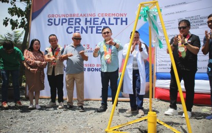 <p><strong>SUPER HEALTH CENTER.</strong> Senator Christopher Lawrence Go, (4th from left) leads the embedding of the capsule during the groundbreaking ceremony of a super health center in Barangay La Filipina, Tagum City, Davao del Norte, on Thursday (July 13, 2023). The PHP11.5-million project will provide all basic health services.<em> (PNA photo by Robinson Niñal Jr.)</em></p>