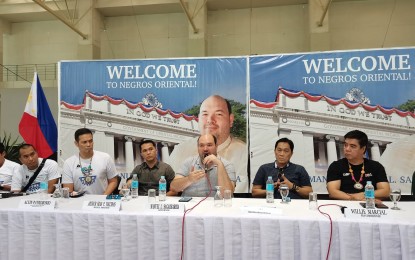 <p><strong>SPORTS TOURISM</strong>. Negros Oriental Gov. Manuel "Chaco" Sagarbarria (4th from left) says on Friday (July 14, 2023) he will ramp up the sports tourism industry in the province. The governor is joined in the photo by Philippine Basketball Association officials and teams for the PBA on Tour game between the Elasto Painters and Templado Hotshots on Saturday in Dumaguete City. <em>(PNA photo by Judy Flores Partlow)</em></p>