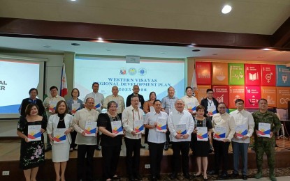 <p><strong>DEVELOPMENT PLAN.</strong> The Western Visayas Regional Development Plan 2023-2028 is officially unveiled by the Regional Development Council and the National Economic and Development Authority in Iloilo City on Friday (July 14, 2023). The plan will serve as the region’s blueprint in pursuit of its socio-economic development for the next six years.<em> (PNA photo by PGLena)</em></p>