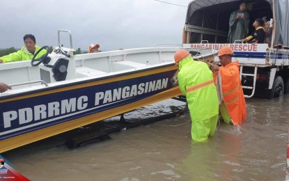 <p><strong>RED ALERT</strong>. Pangasinan Provincial Disaster Risk Reduction and Management Office personnel prepare rescue equipment amid the continuing torrential rains in this file photo on July 17, 2023. The province was placed under a red alert status due to Super Typhoon Egay on Tuesday (July 25, 2023). <em>(File photo courtesy of PDRRMO Facebook page)</em></p>