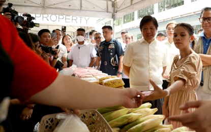 <p class="p1"><strong>STOPPING HUNGER.</strong> President Ferdinand R. Marcos Jr. checks a food table during the pilot implementation of the “Walang Gutom 2027: Food Stamp Program” at the Don Bosco Youth Center Tondo – Technical Vocational Education and Training Center in Manila on July 18, 2023. Malacañang issued Executive Order No. 44 establishing the Department of Social Welfare and Development-led initiative as a flagship program of the national government. <em>(PNA photo by Rey Baniquet)</em></p>