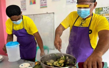<p><strong>REFORMING EATING HABITS</strong>. Detainees at the Quezon District Jail on Thursday (July 20, 2023) join a cooking contest as part of Nutrition Month activities. Competitors were encouraged to prepare healthy meals from locally-sourced ingredients. <em>(Photo by Belinda Otordoz)</em></p>
