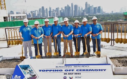 <p dir="ltr"><strong>TOPPING OFF</strong>. Former Senator Ralph Recto ( left to right), Senator Christopher Lawrence Go, Senate Majority Leader Joel Villanueva, former Senate President Vicente Sotto III, Senate President Juan Miguel Zubiri, and Senators Nancy Binay, Ronald dela Rosa, and Joseph Victor Ejercito lead the topping-off ceremony of the New Senate Building in Fort Bonifacio, Taguig City on Thursday (July 20, 2023). Despite delays brought on by the pandemic, Binay said partial operations are expected to start in the new building in July 2024. <em>(Photo courtesy of the Office of Senator Nancy Binay)</em></p>