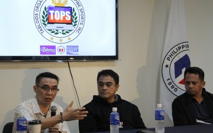 <p><strong>TOPS FORUM</strong>. Philippine Table Tennis Federation president Ting Ledesma (left) talks about the World Table Tennis Youth Contender tournament during the Tabloids Organization in Philippine Sports, Inc. (TOPS) 'Usapang Sports' forum at the Philippine Sports Commission (PSC) Conference Room inside the Rizal Memorial Sports Complex in Malate, Manila on Thursday (July 20, 2023). He said PTTF is gearing up for two international tournaments, including one that the country will be hosting in October.<em> (PNA photo by Jesus M. Escaros)</em></p>
