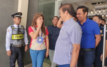 <p><strong>ONE AGRI.</strong> Senator Imee Marcos (left) is welcomed by Misamis Oriental Gov. Peter Unabia (center) and Misamis Oriental League of Municipalities of the Philippines-Misamis Oriental chapter president Donato Chan (right) on Thursday (July 20, 2023) when she opened projects from the Department of Agriculture in Cagayan de Oro City. She launched some PHP1 billion worth of agriculture projects in the Northern Mindanao Region during the visit.<em> (PNA photo by Ercel Maandig)</em></p>