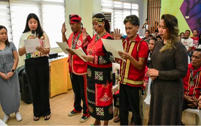 <p><strong>TRIBAL REPS.</strong> Las Nieves town Mayor Karen Rosales (2nd from left) presides over the oath-taking of the three new Indigenous People Mandatory Representatives for Barangays San Roque, Katipunan, and Bonifacio on Thursday, July 20, 2023. The new IPMRs are expected to represent the Manobo tribe and communities to the local councils of the three villages. <em>(Photo courtesy Las Nieves MIO)</em></p>