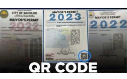 <p><strong>QR CODE</strong>. The City of Bacolod places a QR (quick response) code as a security feature on the business permits being released by the City Mayor’s Office through the Business Permits and Licensing Office. As of Friday (July 21, 2023), reports showed at least 90 fake business permits have been found during the renewal process. <em>(Screenshot from Albee Benitez Facebook video)</em></p>