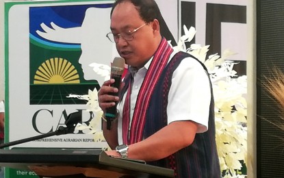 <p><strong>ALMOST DONE.</strong> Samuel Solomero, regional director of the Department of Agrarian Reform-Cordillera Administrative Region, leads the 14-day “Kordilyera Negosyo Agraryo Trade Fair" at SM Baguio City on Friday (July 21, 2023). He said 97 percent of the target 97,000 hectares of land under the Comprehensive Agrarian Reform Program have already been distributed. <em>(PNA photo by Liza T. Agoot)</em></p>
<p><em> </em></p>
<p> </p>