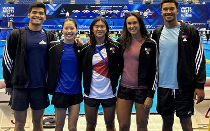 <p><strong>READY</strong>. Filipino swimmers (from left) Jerard Dominic Jacinto, Xandi Chua, Thanya Angelyn Dela Cruz, Jasmine Alkhaldi, and Jarod Hatch pose at the competition venue of the 20th World Aquatics Championships in Fukuoka, Japan on Saturday (July 22, 2023). All medalists at the Cambodia Southeast Asian Games last May, they will try to rack up ranking points and improve their chances to make the 2024 Paris Olympics. <em>(Contributed photo by Ryan Paolo Arabejo)</em></p>