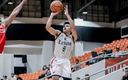 <p><strong>COMEBACK WIN</strong>. Kurt Reyson scores eight of Letran's last 11 points to lead an 85-84 squeaker against San Beda in the Bola.TV AsiaBasket Las Piñas Championship at the city’s Villar Coliseum on Friday (July 21, 2023). Reyson led Letran with 19 points, eight rebounds, eight assists, and one steal. <em>(Photo courtesy of AsiaBasket)</em></p>