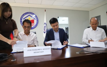 <p><strong>500,000 HOUSING UNITS</strong>. Department of Human Settlements and Urban Development Secretary Jose Rizalino Acuzar and Bases Conversion and Development Authority president/chief executive officer Joshua Bingcang and chair Delfin Lorenzana (seated, from left) sign a memorandum of understanding formalizing their partnership under the Pambansang Pabahay Para sa Pilipino Housing Program on July 10, 2023. Some half a million housing units will be built in New Clark City, Tarlac for residents and workers in the former air base, families affected by government projects in the area, state employees and the military. <em>(Photo courtesy of BCDA)</em></p>