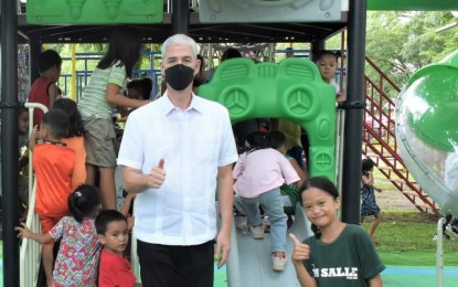 <p><strong>LIFTED</strong>. Negros Occidental Governor Eugenio Jose Lacson with young kids at the reopening of the Provincial Capitol Lagoon Children's Playground in Bacolod City on July 21, 2023. On Monday (July 24), Lacson welcomed the lifting of the state of public health emergency declared due to the Covid-19 pandemic, saying it would boost economic growth and tourism development. <em>(Photo courtesy of PIO Negros Occidental)</em></p>