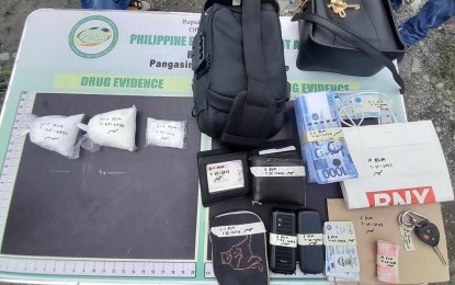 <p><strong>BUSTED</strong>. Law enforcers seize 225 grams of suspected shabu from three individuals in a buy-bust operation in Sison, Pangasinan on Tuesday (July 25, 2023). The suspected drugs seized from the suspects were worth PHP1.6 million. <em>(Photo courtesy of PDEA Pangasinan)</em></p>