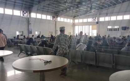 <p><strong>STRANDED</strong>. The situation at the ferry terminal in Allen, Northern Samar in this July 24, 2023 photo. The number of stranded Luzon-bound passengers in Allen, Northern Samar rose to 2,334 Tuesday noon as authorities continue to impose sea trip cancelations in the province due to high waves brought about by Super Typhoon Egay. <em>(Photo courtesy of Philippine Coast Guard)</em></p>