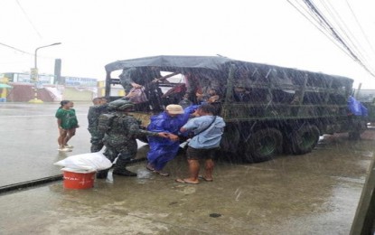 <p><strong>EGAY'S WRATH.</strong> Rescuers continue evacuation works in Santa Ana town, Cagayan province even as Typhoon Egay starts to veer away from the province on July 26, 2023. The office of Speaker Ferdinand Martin G. Romualdez and the Tingog Party-list on Thursday (July 27) allocated and arranged the release of a total of PHP128.5 million in relief goods and financial assistance to typhoon victims in Northern Luzon.<em> (Photo courtesy of MDRRMO-Santa Ana)</em></p>