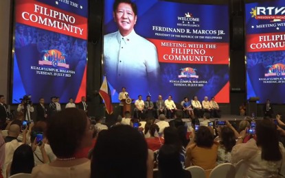 <p class="p1"><strong>MEET-AND-GREET.</strong> President Ferdinand R. Marcos Jr. meets with the Filipino community in Kuala Lumpur during the first day of his state visit to Malaysia on Tuesday (July 25, 2023). In his speech, Marcos vowed to protect the welfare of overseas Filipino workers. <em>(Screenshot from Radio Television Malacañang)</em></p>