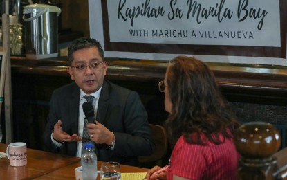 <p><strong>LEGITIMATE RESULTS.</strong> Commission on Elections chairperson George Erwin Garcia answers questions from the media about the upcoming Barangay and Sangguniang Kabataan elections at the Kapihan sa Manila Bay in Malate, Manila, on Wednesday (July 26, 2023). In a separate statement released Thursday night (July 27) he junked allegations of "rigged" 2022 National and Local Elections. <em>(PNA photo by Yancy Lim)</em></p>