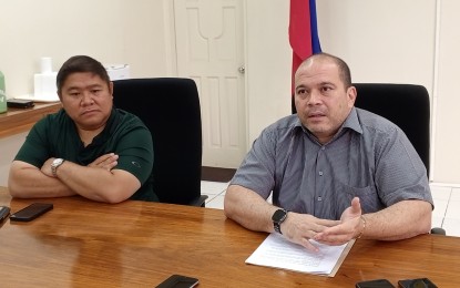 <p><strong>SUGAR MILLING SEASON</strong>. Administrator Pablo Luis Azcona (right) of the Sugar Regulatory Administration, with Board Member Dave Sanson, who represents the planters, discusses the reopening of the milling season on September 1 for the crop year 2023-2024 during a press conference at the SRA office in Bacolod City on Thursday (July 27, 2023). “(It’s) a first in a series of deferment of dates in the next three years to go back to the original mill opening which is October 1. By 2025, we will (be) back on track with the hope that our annual production will increase,” Azcona said. <em>(PNA photo by Nanette L. Guadalquiver)</em></p>