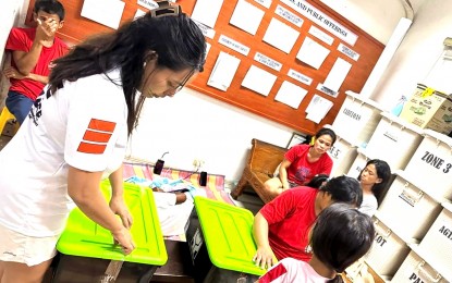 <p><strong>DISASTER AID</strong>. Evacuees in the province of Abra in northern Philippines receive family food packs and non-food items after they were transferred to evacuation centers to keep them safe from the wrath of Typhoon Egay. The weather disturbance resulted to major flooding and several landslides in the Cordillera Administrative Region (CAR). <em>(Photo courtesy of DSWD-CAR)</em></p>