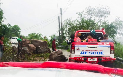 <p><strong>CLEARING OPERATION.</strong> Personnel of the La Union Provincial Disaster Risk Reduction and Management Office conduct a clearing operation on the road obstruction brought by the effect of Typhoon Egay on Thursday (July 27, 2023). Typhoon Egay left an initial PHP1.07 million worth of damage mainly to agriculture in the provinces of Pangasinan and La Union<em>. (Photo courtesy of Province of La Union)</em></p>