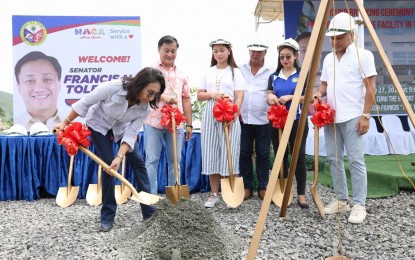 <p><em>MEDICAL FACILITY.</em> Cebu Governor Gwendolyn Garcia (left) shoves concrete over the time capsule laid during the groundbreaking ceremony of a 150-bed medical facility in Barangay Poblacion, Naga City in Cebu Province on Thursday (July 27, 2023) as Sen. Francis Tolentino (second from left), Mayor Valdemar Chiong (right) and other officials look on. The construction of the PHP350-million facility is part of the provincial government’s bid to bring health services in every locality through its hospital expansion and equipping program. <em>(Photo courtesy of Cebu Capitol PIO)</em></p>