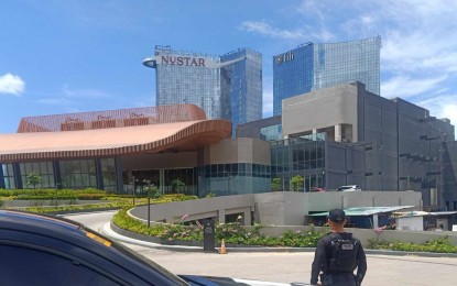 <p><strong>BUSINESS SUMMIT.</strong> A police force stands guard in front of the Nustar Resort and Casino at the South Road Properties in Cebu City on Thursday (July 27, 2023). President Ferdinand R. Marcos Jr. is expected to address over 200 delegates and guests during the opening plenary of the third leg of the Asia-Pacific Economic Cooperation Business Advisory Council (ABAC) meeting on Friday. <em>(Photo courtesy of Cebu Mobile Force Company)</em></p>