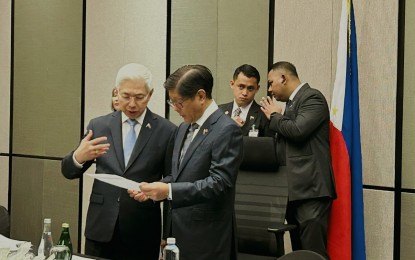 <p><strong>$285-M PLEDGES.</strong> Department of Trade and Industry (DTI) Secretary Alfredo Pascual (left) and President Ferdinand R. Marcos Jr. (right) chat on the sidelines of the roundtable meeting with Malaysian businessmen at EQ Kuala Lumpur Hotel on July 27, 2023. The Presidential State Visit from July 25 to 27 generated a total of USD285 million in investment pledges. <em>(Courtesy of DTI)</em></p>