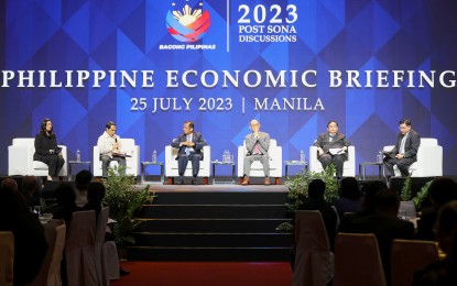 <p><strong>GOVERNMENT AGENDA.</strong> The Philippine economic team, led by National Economic and Development Authority Secretary Arsenio Balisacan and Finance Secretary Benjamin Diokno (3<sup>rd</sup> and 4<sup>th</sup> from left), and members of the private sector and international financing institutions highlight the country’s strong economic performance and positive outlook in the administration’s second post-State of the Nation Address Philippine Economic Briefing at the Philippine International Convention Center in Pasay City on July 25, 2023. Three other briefings are scheduled in Davao City on Wednesday (Aug. 9), Cebu City, Cebu province on Friday (Aug. 11) and Laoag City, Ilocos Norte on Monday (Aug. 14). <em>(PNA photo by Jess M. Escaros Jr.)</em></p>