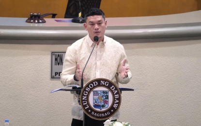 <p><strong>STATE OF THE CITY.</strong> Davao City Mayor Sebastian Z. Duterte delivers his first State of the City Address at the Sangguniang Panlungsod Building on Friday (July 28, 2023). Duterte highlighted the digitalization efforts of the city government during his first year in office. <em>(PNA photo by Robinson Niñal Jr.)</em></p>