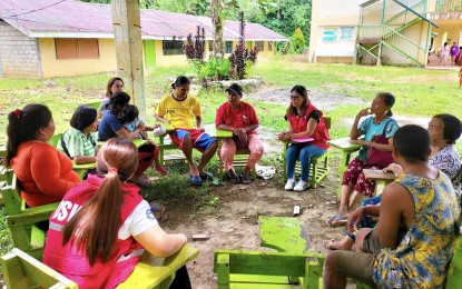 <p><strong>INTERVENTION.</strong> The Department of Social Welfare and Development in the Caraga Region conducts psychological first aid sessions on July 28 and 29, 2023 for 83 families who were forced to abandon their homes following a skirmish between government forces and New People’s Army insurgents on July 24 in Barangay Bigaan, Hinatuan, Surigao del Sur. The evacuees were provided with non-food items before they returned home on Saturday. <em>(Photo courtesy of DSWD-13)</em></p>