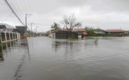 <p><strong>UNDER WATER.</strong> This portion of Apalit-Macabebe-Masantol Road in Barangay San Gabriel in Macabebe, Pampanga is still not passable to all types of vehicles due to flood as of 12 noon Sunday (July 30, 2023), the Department of Public Works and Highways reported. Due to massive flooding brought by the southwest monsoon and Typhoon Egay, some areas in Central Luzon were placed under a state of calamity. <em>(Photo courtesy of DPWH Region 3)</em></p>