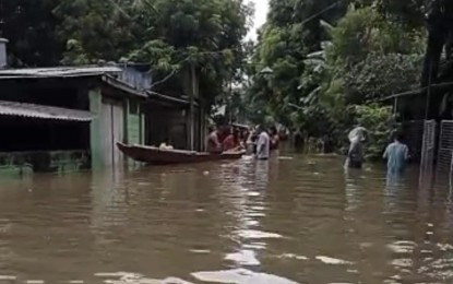 <p><strong>WATERWORLD</strong>. Residents of San Simon, Pampanga use a boat as a mode of transportation as the town remains underwater on Monday (July 31, 2023). San Simon is one of the local government units in Pampanga that declared a state of calamity following the onslaught of Typhoon Egay and the enhanced southwest monsoon. <em>(Photo courtesy of San Simon MDRRMO)</em></p>
