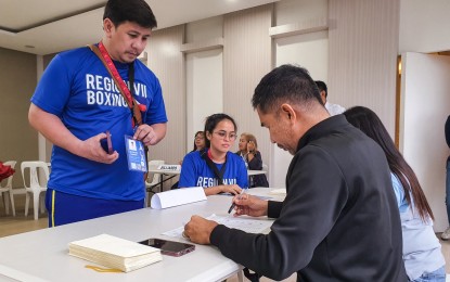<p><strong>'PALARO' FREEBIES.</strong> Participants of the 2023 Palarong Pambansa claim shoe vouchers distributed by the Marikina city government at the city hall on Tuesday (Aug. 1, 2023). The vouchers can be exchanged for shoes at any stall at the Palaro Shoe Bazaar located adjacent to Freedom Park. <em>(Photo courtesy of Marikina LGU)</em></p>