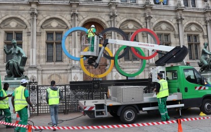 <p>Climate activists spread fake blood on Olympic rings monument in Paris, France on July 27, 2023. The rings were cleared by officials. <em>(Umit Donmez-Anadolu Agency)</em></p>