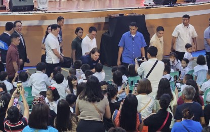 <p><strong>'TARA BASA'. </strong>Education Secretary, Vice President Sara Z. Duterte (center, in dark blue shirt), greets Grade 1 students during the launch of the "<em>Tara, Basa</em>!" Tutoring Program at the Rizal High School in Pasig City on Wednesday (Aug. 2, 2023). Duterte was accompanied by Social Welfare Secretary Rex Gatchalian, Pasig City Mayor Vico Sotto, and Pasig City Rep. Roman Romulo. <em>(PNA photo by WIlnard Bacelonia)</em> </p>