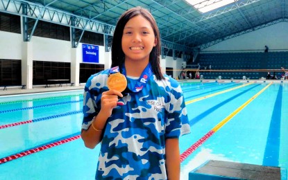 <p><strong>CHAMPION.</strong> National Capital Region tops the elementary girls’ 7-12 200-meter freestyle relay event in the Palarong Pambansa swimming competition at the Marikina Sports Center on Wednesday (Aug. 2, 2023). The team, composed of Jamie Aica Summer Sy (in photo), Isabella Beatrice Gestuvo, Gabrielle Gayle Ocampo and Adrienne Reese Tacuboy, won the race in 2:04.04. <em>(PNA photo by Jean Malanum)</em></p>