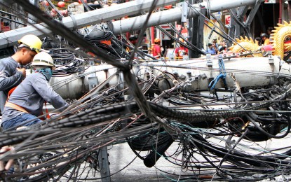 <p><strong>FALLEN POSTS.</strong> Several electric posts fell off the streets along Plaza Lorenzo Ruiz near the Binondo Church, in Manila on Thursday afternoon (Aug. 3, 2023). The downed posts hit some vehicles, injured three persons, and disrupted traffic in the area. According to the Minor Basilica and National Shrine of San Lorenzo Ruiz in Binondo, Manila, power was restored on Friday (Aug. 4, 2023). <em>(PNA photo by Yancy Lim)</em></p>