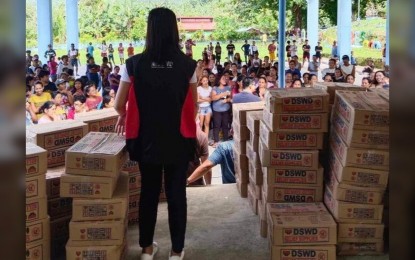 <p><strong>GOVERNMENT AID. </strong>The Department of Social Welfare and Development in Bicol (DSWD-5) distributes 6,418 family food packs to families in Camarines Sur affected by Typhoon Egay and enhanced southwest monsoon or "<em>habagat</em>". DSWD Bicol on Friday (Aug. 4, 2023) said they are still verifying more affected families from the  provinces in Bicol Region<em>. (Photo courtesy of DSWD Bicol) </em></p>