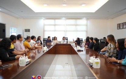 <p><strong>MEETING WITH BUDGET OFFICERS</strong>. Budget Secretary Amenah Pangandaman (at the head of the table) meets with the officers and members of the Association of Local Budget Officers in Batangas on Friday (Aug. 4, 2023). During the meeting, Pangandaman said her department would conduct a series of roadshows on public financial management. <em>(Photo courtesy of DBM)</em></p>