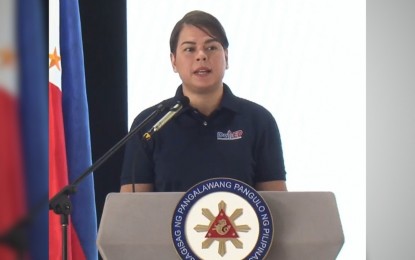 <p><strong>BRIGADA ESKWELA.</strong> Vice President Sara Z. Duterte, also Department of Education Secretary, delivers a speech during the kick-off of <em>Brigada Eskwela</em> 2023 held at Tarlac National High School Monday (Aug. 7, 2023). Duterte cited the "<em>bayanihan</em>" (working together) spirit as one of the essence of the <em>Brigada Eskwela</em>.<strong> </strong><em>(Screenshot from DepEd Philippines FB Page) </em></p>
