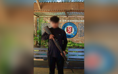<p><strong>RIGHT MOVE.</strong> A teenage member of the Daesh-inspired Dawlah Islamiya terrorist group poses with his rifle after he voluntarily surrenders to military authorities in Madalum town, Lanao del Sur province on Saturday (Aug. 5, 2023). Known only as 'Taimiya”, he told state forces that he was recruited and joined the DI at age 11 to fight government forces in Madalum. <em>(Photo courtesy of Army’s 103Bde)</em></p>