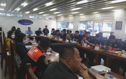 <p><strong>SECURITY MEETING</strong>. Commission on Elections-Baguio election supervisor John Paul Martin (foreground, center) presides over a City Joint Security Control Center (CJSCC) meeting at the Baguio City Police Office on Wednesday (Aug. 9, 2023). During the meeting, Soraya Faculo, OIC Schools Division Superintendent of the Department of Education-Baguio, said they hope to submit the list of 1,600 teachers who will serve as members of the electoral board during the Barangay and Sangguniang Kabataan elections on Oct. 30. <em>(PNA photo by Liza T. Agoot)</em></p>
