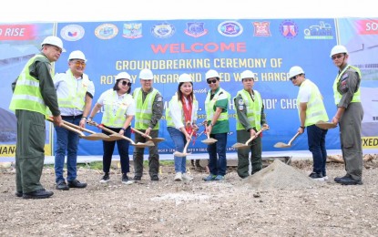 <p>HANGAR PROJECT. Lapu-Lapu City Rep. Cynthia King-Chan (fifth from left) leads military and public officials in the capsule-laying and groundbreaking ceremony for the fixed wing and rotary air assets of the Philippine Air Force at the Mactan-Benito Ebuen Air Base Thursday (Aug. 10, 2023). The hangar will serve as a maintenance bay for PAF aircraft to ensure their engines' great condition and in the improvement of the air force operations. <em>(Photo courtesy of Cong. Cynthia King-Chan's FB page)</em></p>