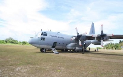 <p>One of the PAF Lockheed C-130 "Hercules" cargo transport aircraft seen on the runway of Pag-asa Island in April 2017.<em> (PNA file photo by Priam Nepomuceno)</em></p>