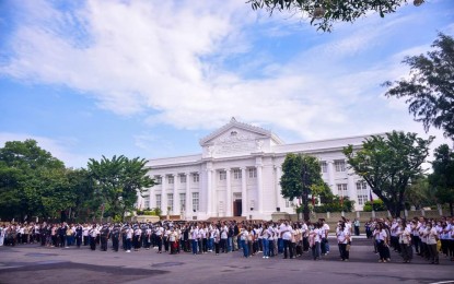 <p><strong>PANGASINAN CAPITOL</strong>. Employees attend a flag-raising ceremony in front of the provincial capitol of Pangasinan on Feb. 2, 2023. The provincial treasurer's office reported an increase in revenue collection during the first quarter of 2023. <em>(Photo courtesy of Province of Pangasinan Facebook)</em></p>