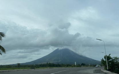 <p><strong>ALERT LEVEL 3</strong>. Mayon Volcano photographed in Camalig, Albay on Sunday (Aug. 13, 2023). Government assistance to families in Albay province affected by the ongoing unrest of Mayon Volcano has so far reached PHP323.3 million. <em>(PNA photo by Connie Calipay)</em></p>