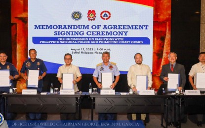 <p><strong>POLL SECURITY MEASURES.</strong> The Commission on Elections (Comelec) signs on Tuesday (Aug. 15, 2023) a memorandum of agreement with the Philippine National Police (PNP) and the Philippines Coast Guard (PCG) in relation to the upcoming Barangay and Sangguniang Kabataan Elections (BSKE). The pact is expected to strengthen their collaboration for election-related security measures before and after the Oct. 30 polls.<em> (Photo courtesy of Comelec)</em></p>