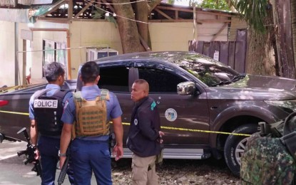 <p><strong>AMBUSHED.</strong> Police examine the pickup truck of Cotabato City of Pedro Tato Jr. after he was ambushed on his way to the city hall along Sebastian Street at 8:30 a.m. Tuesday (Aug. 15, 2023). Fortunately, Tato sustained minor injuries only. <em>(Contributed photo)</em></p>