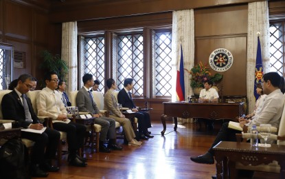 <p><strong>STRONGER PH-JAPAN TIES.</strong> President Ferdinand R. Marcos Jr. welcomes officials of Japan’s Komeito Party during their courtesy call at Malacañan Palace in Manila on Wednesday (Aug. 16, 2023). Marcos expressed hopes that his meeting with the Japanese party officials would lead to closer interaction with Japan, not only on the government-to-government level, but also on the parliamentary level and every level possible. <em>(PNA photo by Alfred Frias)</em></p>